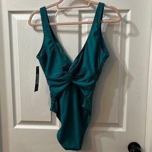 One piece twist front and back v neck swim suit